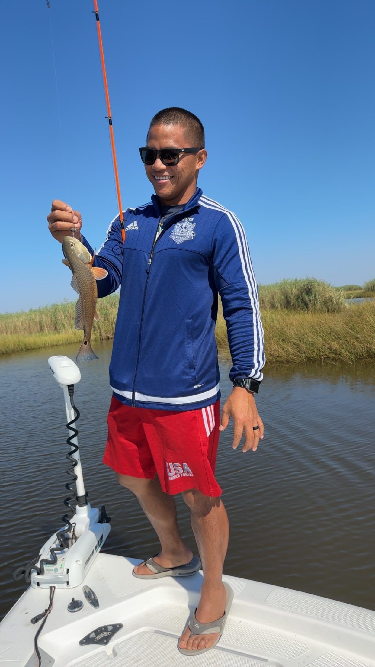 Participants fishing from the pier